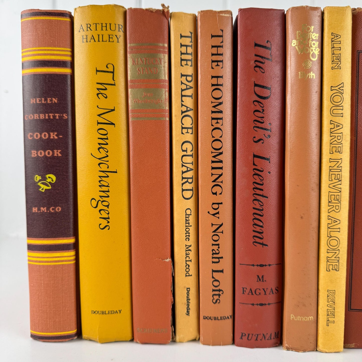 Vintage Copper Mustard Terra Cotta Orange Books for Retro 1970s Shelf Styling and Staging