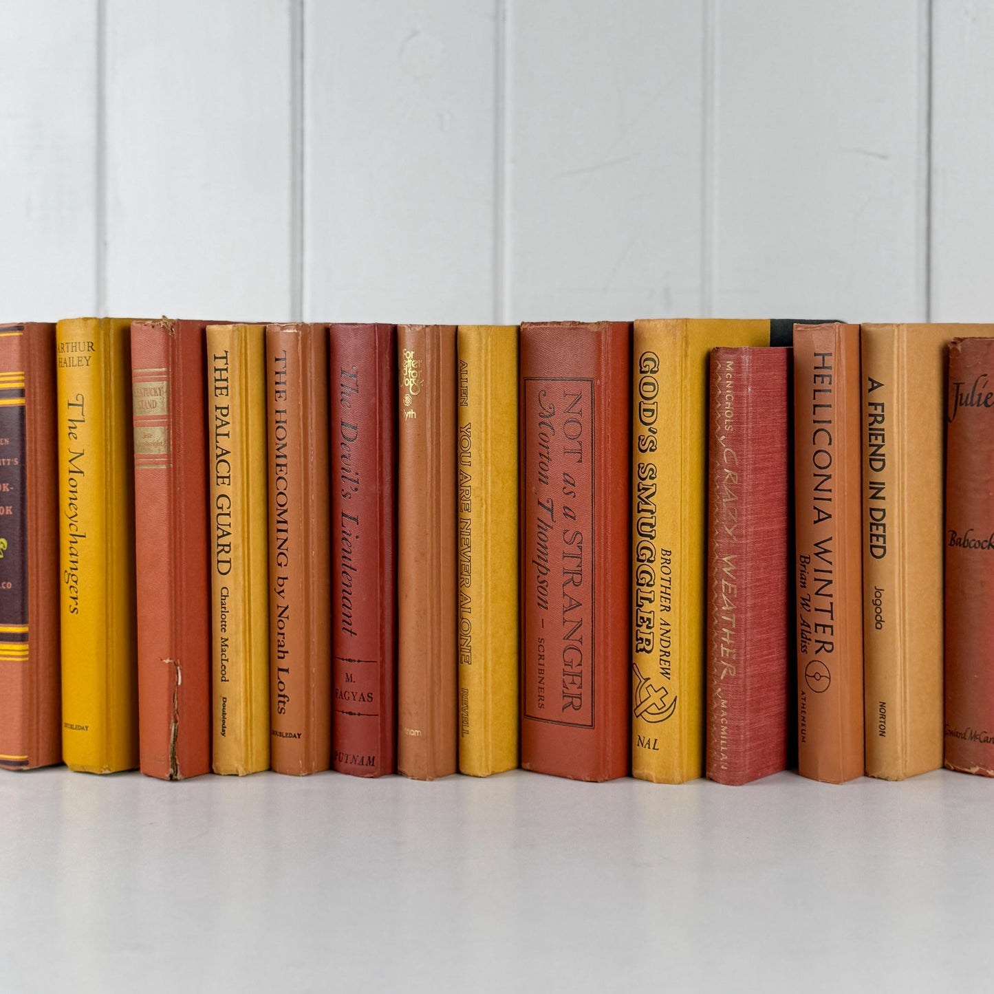 Vintage Copper Mustard Terra Cotta Orange Books for Retro 1970s Shelf Styling and Staging