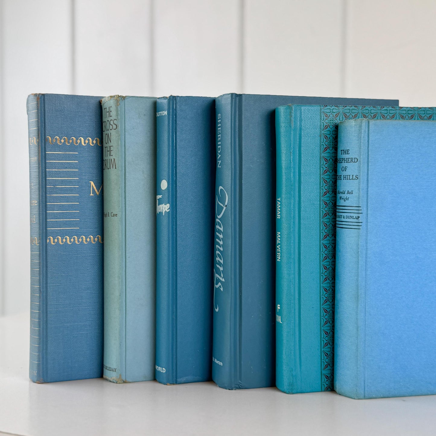 Teal And Aqua Vintage Book Stack for Shelf Styling and Decorating