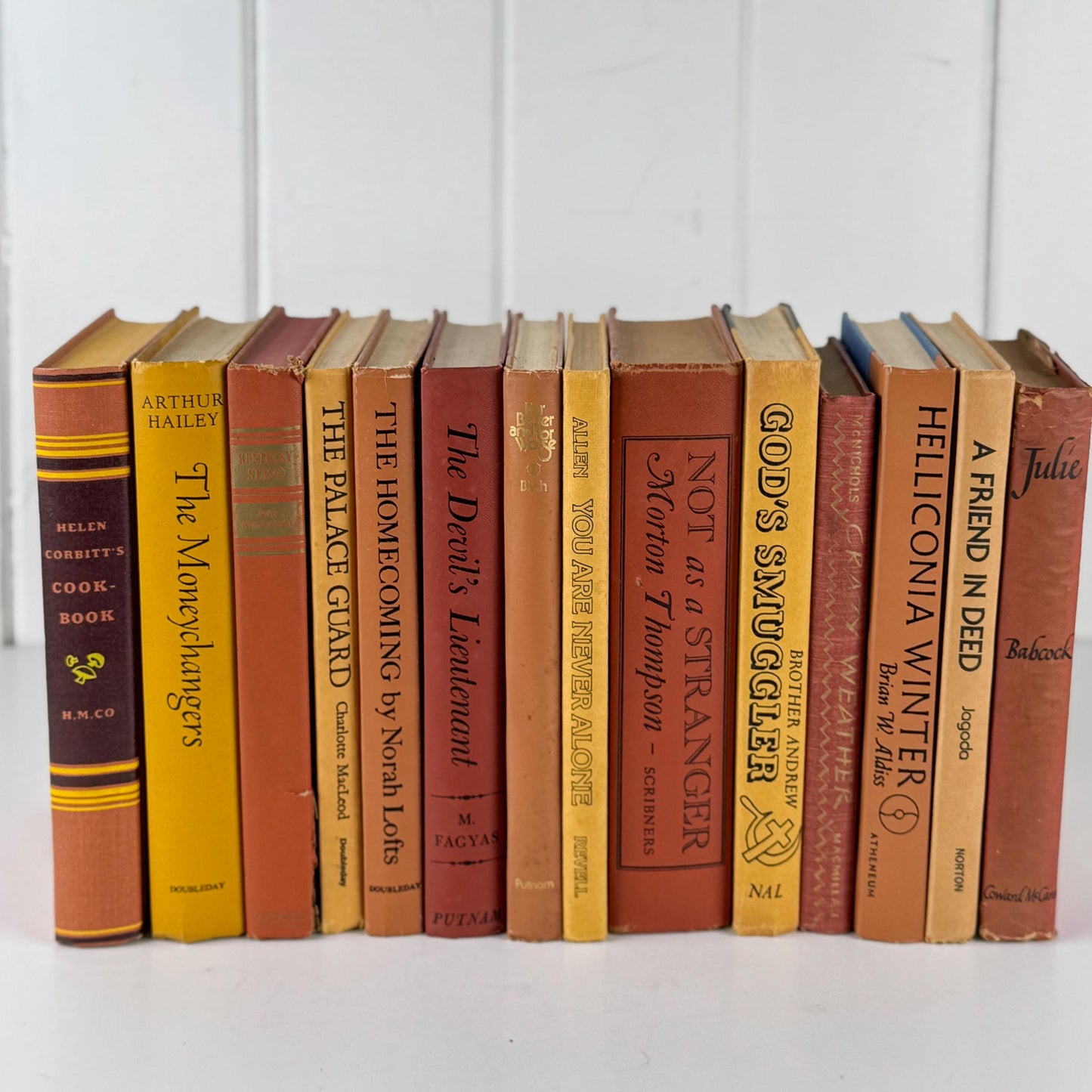 Vintage Copper Mustard Terra Cotta Orange Books for Retro 1970s Shelf Styling and Staging