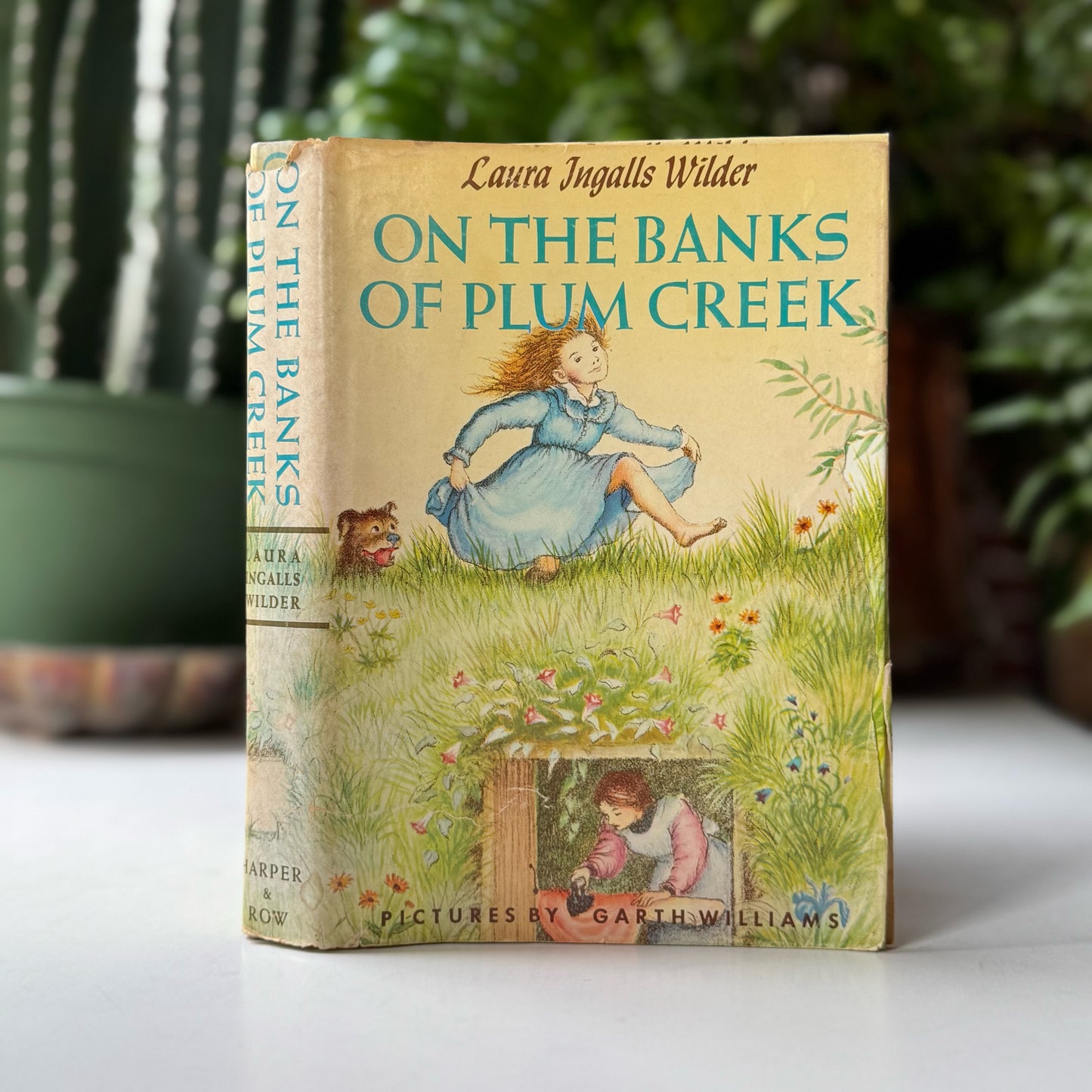 On the Banks of Plum Creek, Laura Ingalls Wilder, 1965 Hardcover with Dust Jacket