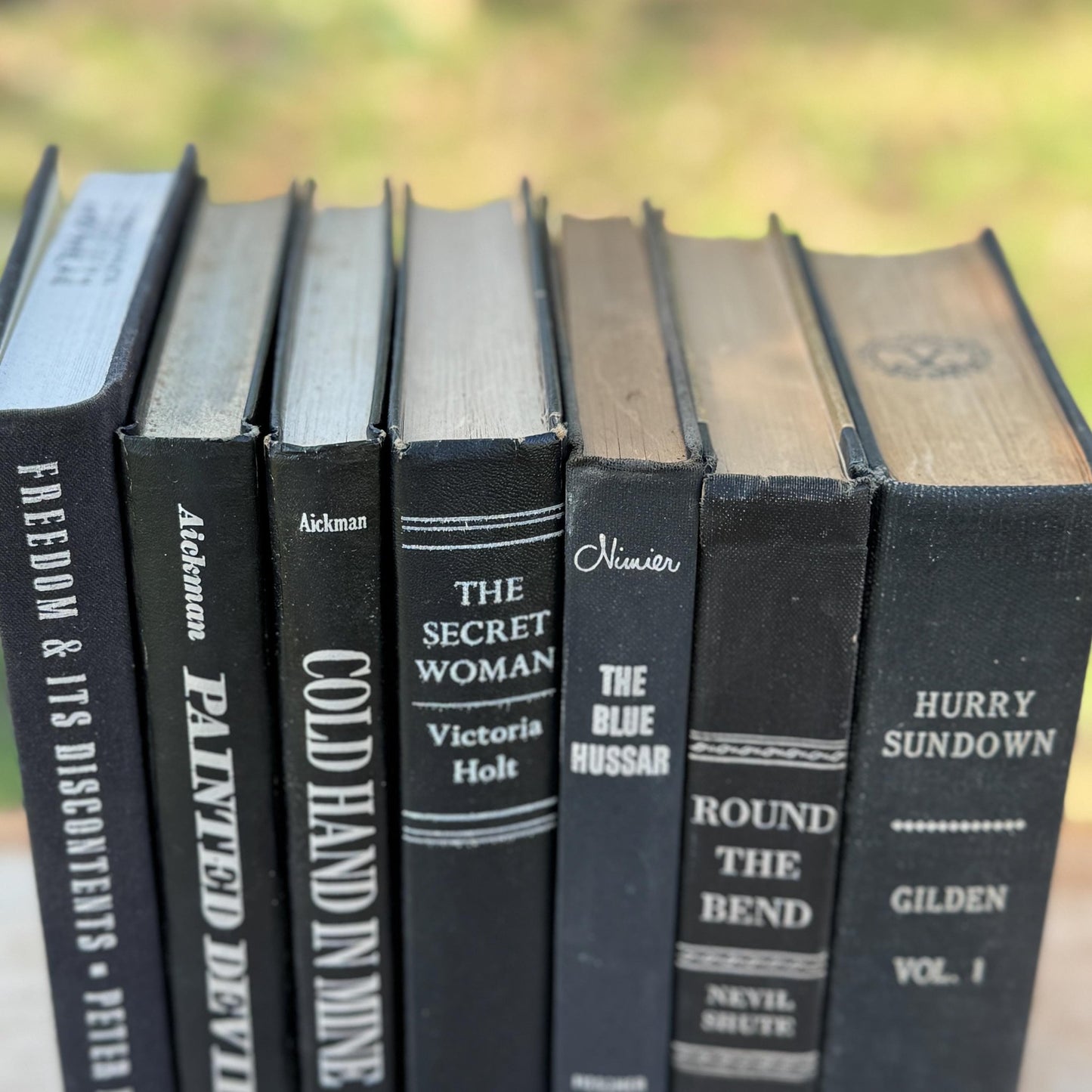 Black and Silver Vintage Books for Moody Shelf Styling - Pretty Old Books