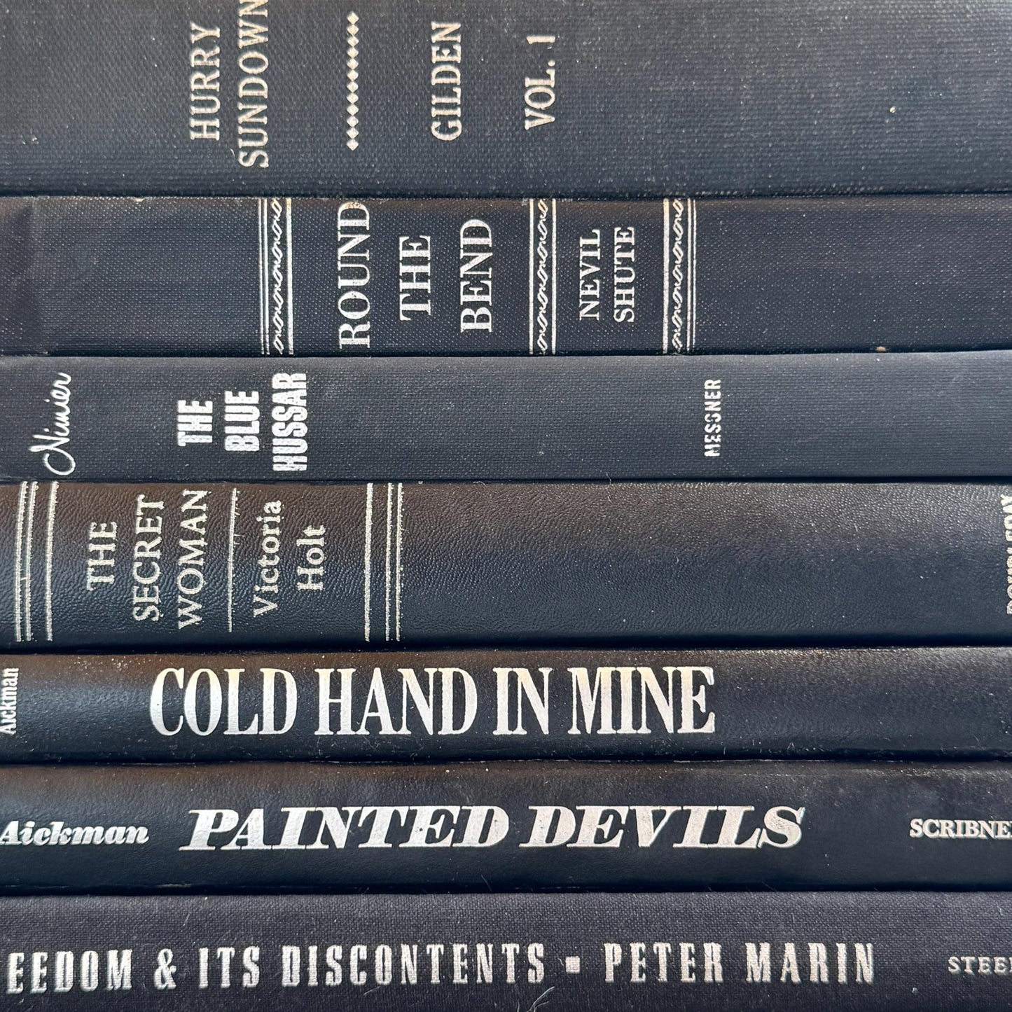 Black and Silver Vintage Books for Moody Shelf Styling - Pretty Old Books