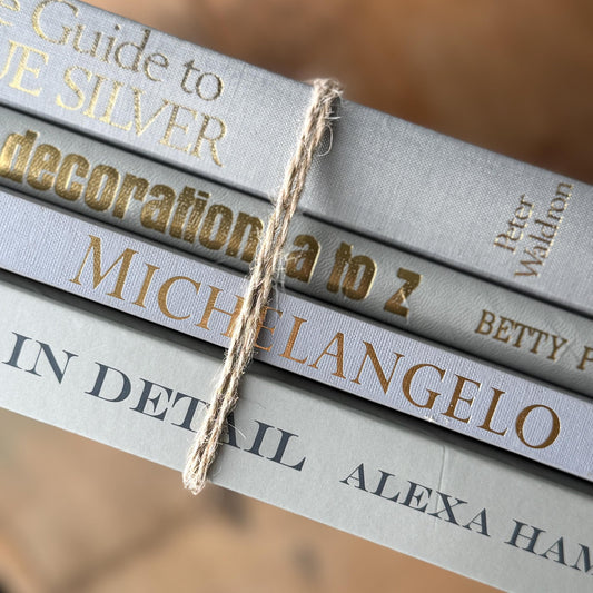 Gray and Gold Coffee Table Book Stack - Pretty Old Books