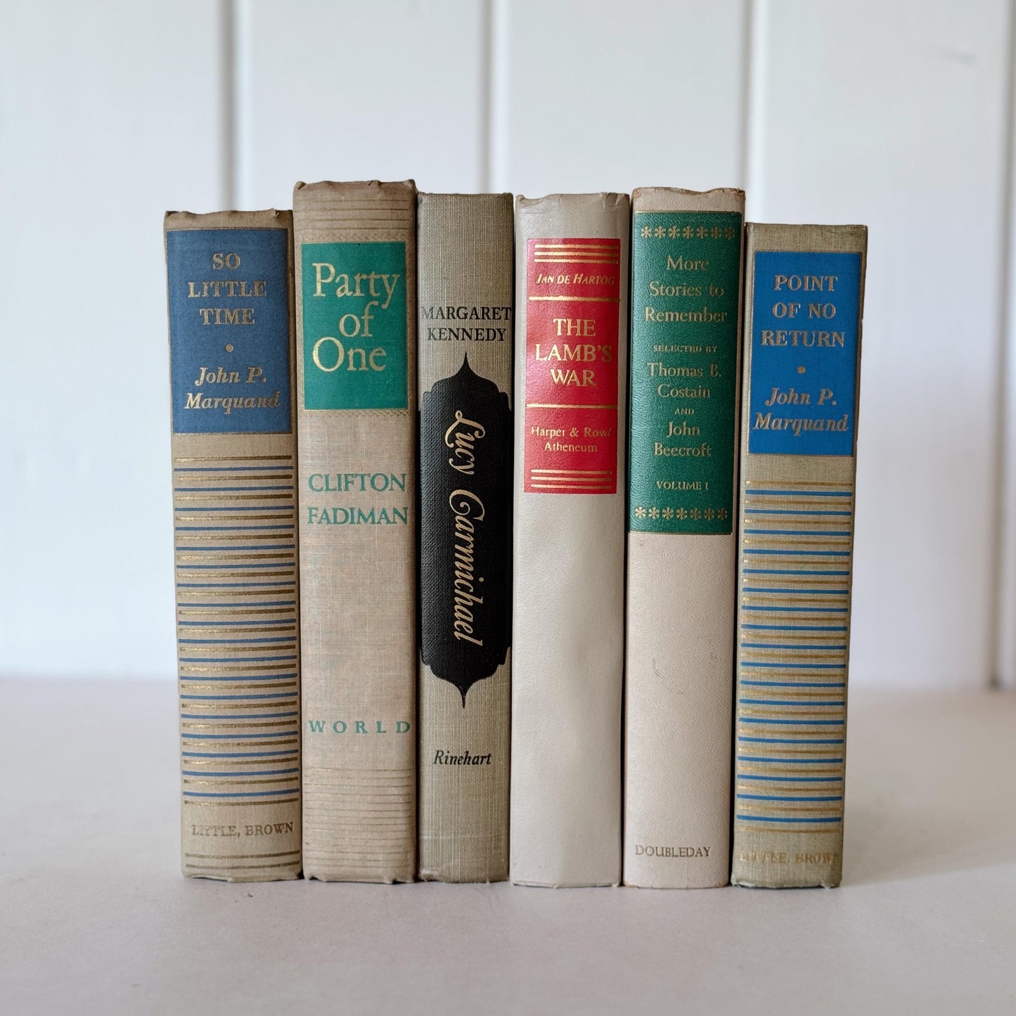 Beige Mid-Century Modern Book Set with Green, Blue, Red, and Black Accents