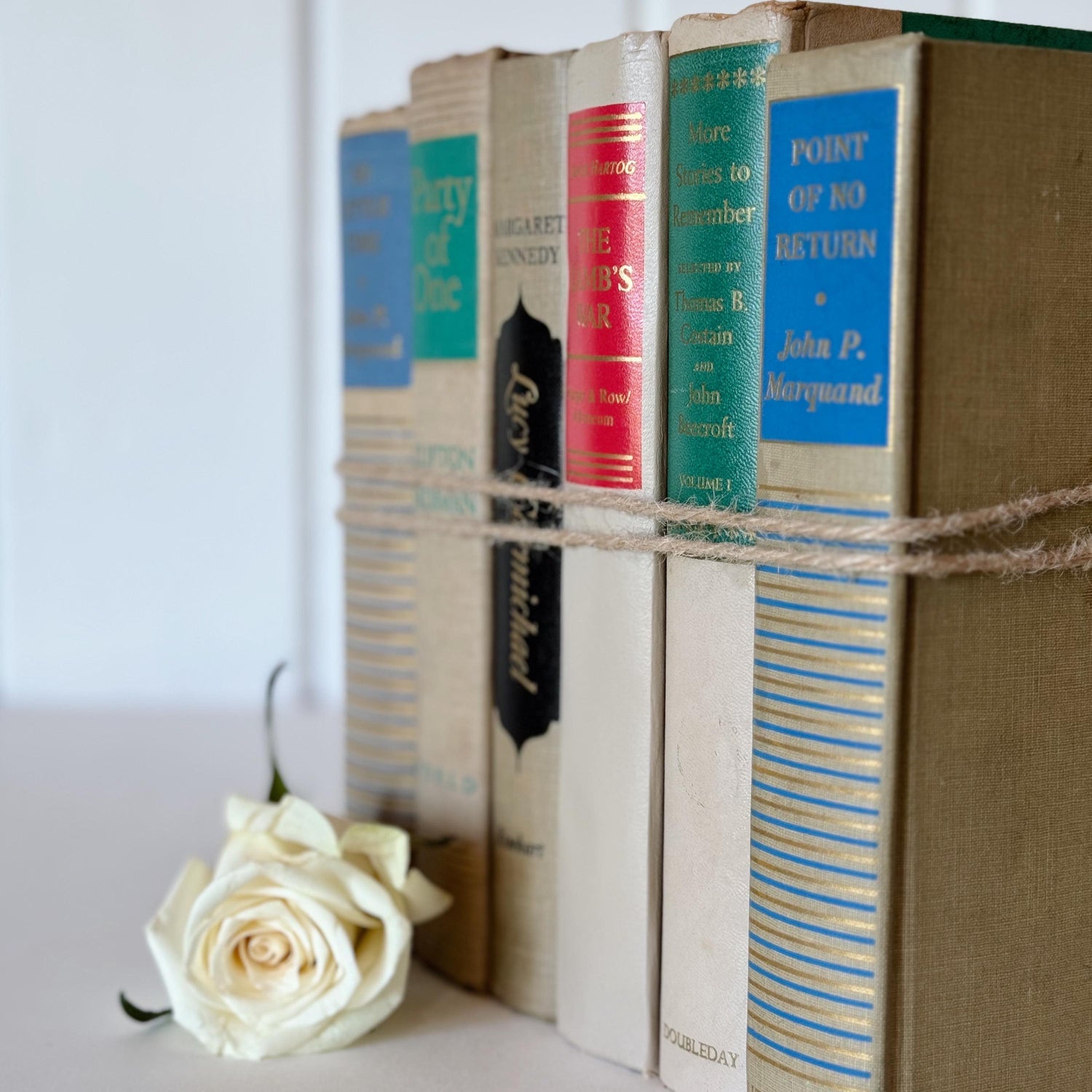 Beige Mid-Century Modern Book Set with Green, Blue, Red, and Black Accents