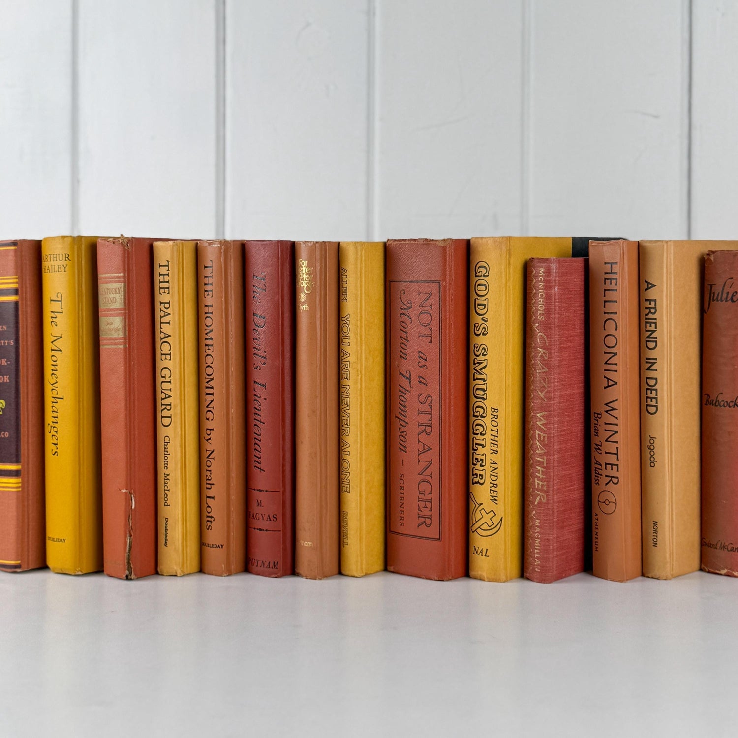 Vintage Copper Mustard Terra Cotta Orange Books for Retro 1970s Shelf Styling and Staging