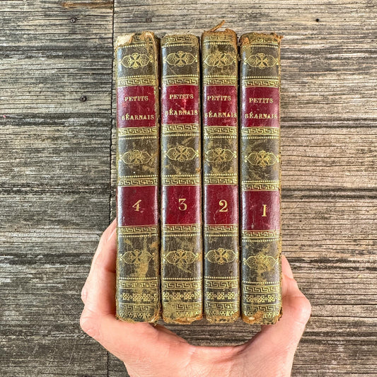 Antique Gold, Black, and Red French Leather Book Set of Les Petits Béarnais by Delafaye, 1824, 4 Volumes