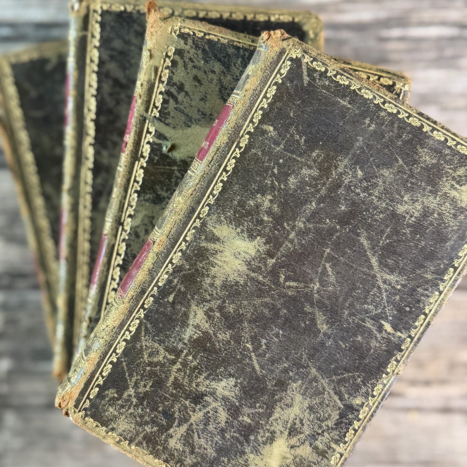 Antique Gold, Black, and Red French Leather Book Set of Les Petits Béarnais by Delafaye, 1824, 4 Volumes