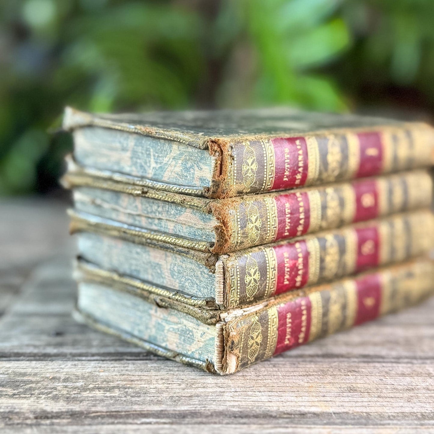 Antique Gold, Black, and Red French Leather Book Set of Les Petits Béarnais by Delafaye, 1824, 4 Volumes