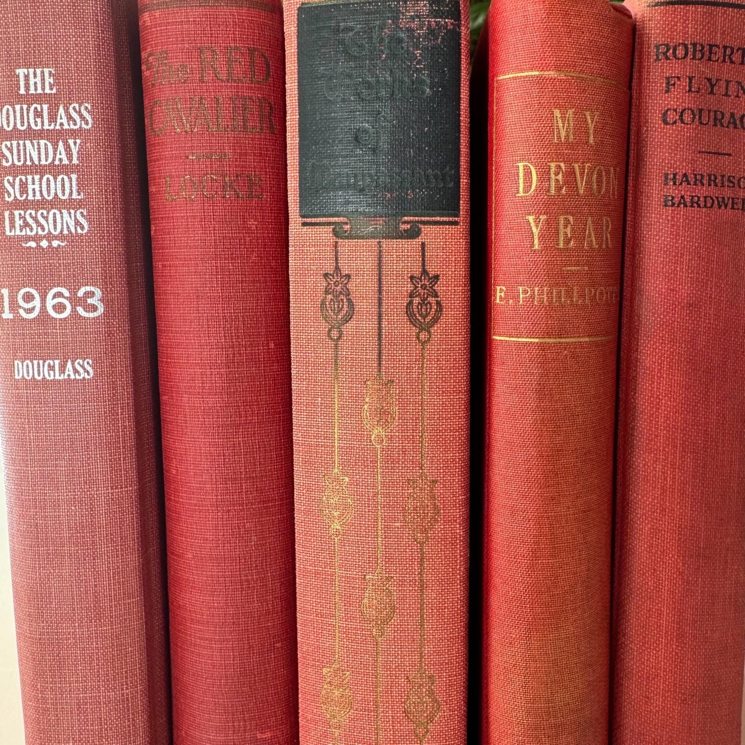 Red and Coral Pink Faded Vintage Books for Shelf Styling - Pretty Old Books
